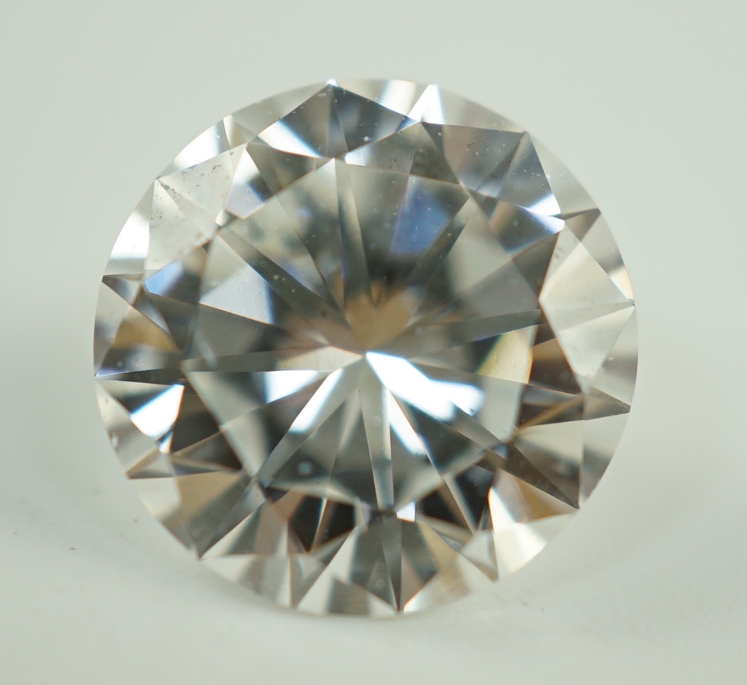 A white metal mounted round brilliant cut diamond, with GIA report dated 27/3/2023 stating the stone to weigh 2.45ct with a colour and clarity of F and SI1.